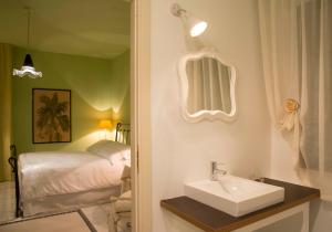 Postel nebo postele na pokoji v ubytování B&B Maison Biagetti