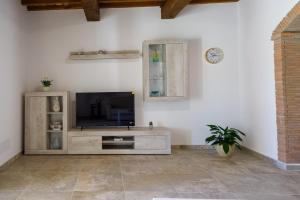 TV a/nebo společenská místnost v ubytování Borgo Felice