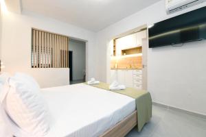 Televisyen dan/atau pusat hiburan di EliGio Luxury Suites