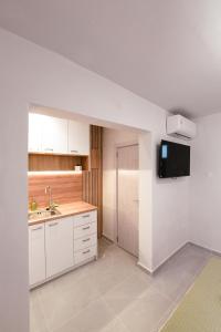 Dapur atau dapur kecil di EliGio Luxury Suites