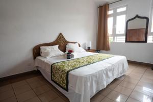 Postel nebo postele na pokoji v ubytování Coastal Getaway in Paradise + 21 fotografií