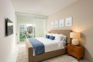 Ένα ή περισσότερα κρεβάτια σε δωμάτιο στο Marea Los Cabos Modern 3 BRD - Prime Location Near Beach & Marina Fast Wifi +7 φωτογραφίες