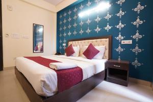 Postel nebo postele na pokoji v ubytování Hotel Tourist Palace