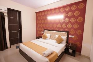 Postel nebo postele na pokoji v ubytování Hotel Tourist Palace