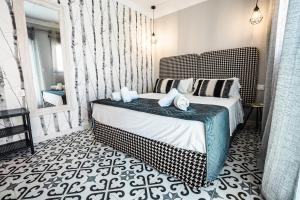 A bed or beds in a room at Ancha Village