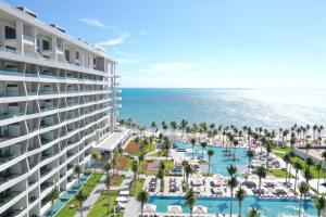 an aerial view of the hotel and the beach at Garza Blanca Resort & Spa Cancun in Canc&uacute;n