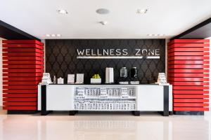a wellness zone with red and black walls and a counter at Garza Blanca Resort & Spa Cancun in Canc&uacute;n