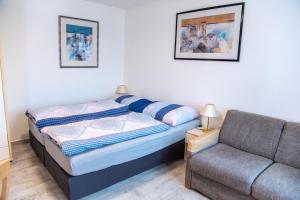 Tempat tidur dalam kamar di Panská