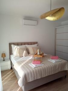 Postel nebo postele na pokoji v ubytování Villa Magdalena