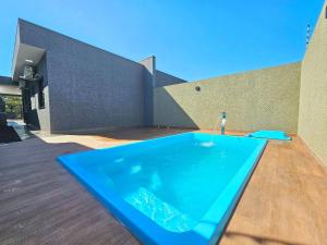 Foto de Casa Novíssima Piscina prox Cataratas e Centro