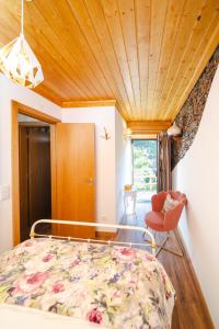 Ένα ή περισσότερα κρεβάτια σε δωμάτιο στο Montanhas do Xisto - Solar do Xisto Poente