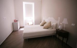 Posteľ alebo postele v izbe v ubytovaní Red Flat In Rome