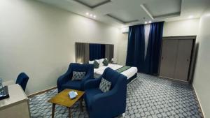 Χώρος καθιστικού στο Quel Serviced Units