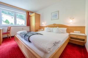 Posteľ alebo postele v izbe v ubytovaní Haus Waldhof