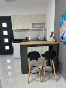 A kitchen or kitchenette at Apartments MASIMO