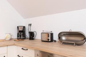 Φωτογραφία από το άλμπουμ του Wohnung Nähe Mainz in ehemaligem Weingut mit 6 Schlafzimmer σε Rommersheim