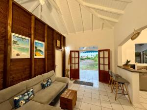 Posezení v ubytování Ti-Coco Lodge - Calme Spacieux Vue Nature Proche Commerces Plages