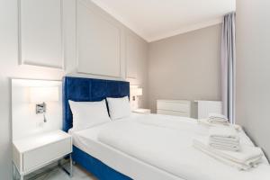 Ένα ή περισσότερα κρεβάτια σε δωμάτιο στο Apartament Baltic Park IIA z Basenem Letnim by HolidaySun