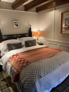a bedroom with two beds in a room at Shieldhall - Cherry Nook in Morpeth