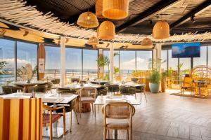 Un restaurante u otro lugar para comer en Boutique Hôtel Kon Tiki Tahiti