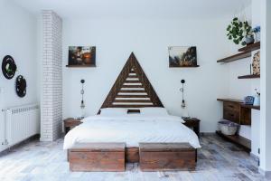 Postel nebo postele na pokoji v ubytování SUKUN Tannourine