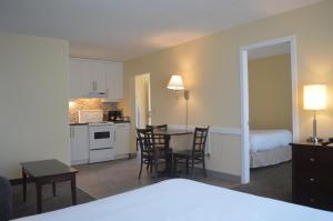 Kuchyň nebo kuchyňský kout v ubytování Siesta Suites