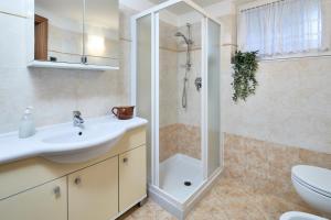 Koupelna v ubytování Bella Villa Apartments