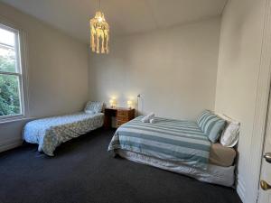 Letto o letti in una camera di Low Cost Accommodation