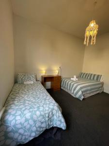 Letto o letti in una camera di Low Cost Accommodation