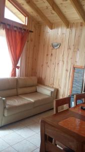 Posezení v ubytování Cabañas Soelafquen