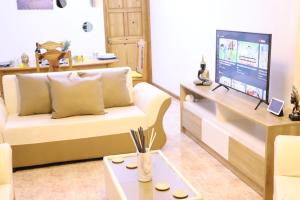 Телевізор і / або розважальний центр в Sunset view Suite