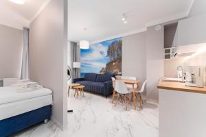 Ένα ή περισσότερα κρεβάτια σε δωμάτιο στο Apartament Baltic Park IIIA z Basenem Letnim by HolidaySun