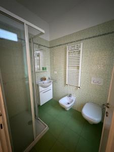 Koupelna v ubytování Artisanti - DANIA HOME