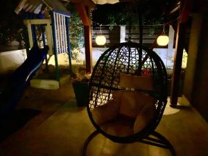 a tennis racket sitting on a slide in a house at House between beaches in Vir +31 photos