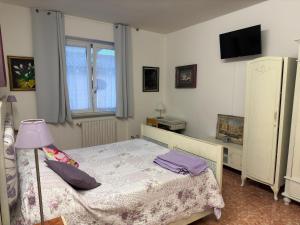 Postel nebo postele na pokoji v ubytování Artisanti - DANIA HOME