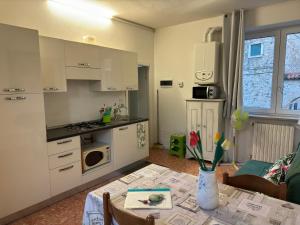 Kuchyň nebo kuchyňský kout v ubytování Artisanti - DANIA HOME