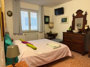 Postel nebo postele na pokoji v ubytování Artisanti - DANIA HOME