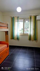 Postel nebo postele na pokoji v ubytování Lungomare Apartament + 8 fotografií