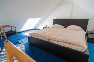 Postel nebo postele na pokoji v ubytování Villa Bergmann