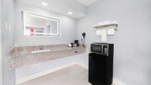 Koupelna v ubytování Executive Inn Hondo