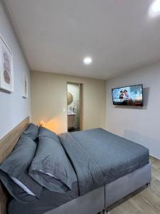 Postelja oz. postelje v sobi nastanitve Hostelfc Usaquen