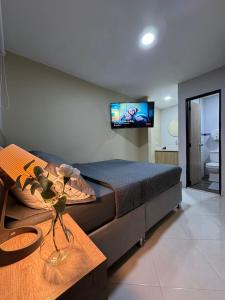 TV in/ali zabaviščno središče v nastanitvi Hostelfc Usaquen
