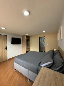 Postelja oz. postelje v sobi nastanitve Hostelfc Usaquen