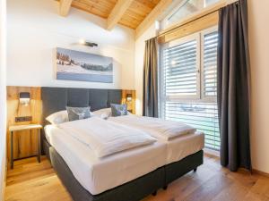Postel nebo postele na pokoji v ubytování Grebenzen Lodge Hirsch