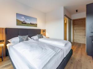 Postel nebo postele na pokoji v ubytování Grebenzen Lodge Hirsch