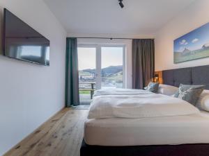 Postel nebo postele na pokoji v ubytování Grebenzen Lodge Hirsch