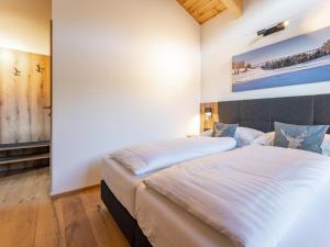 Postel nebo postele na pokoji v ubytování Grebenzen Lodge Hirsch