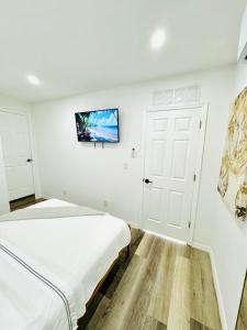 Postel nebo postele na pokoji v ubytování Cozy Studio