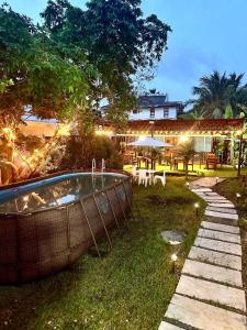 Um jardim em Eco-Hotel Palma É Coco