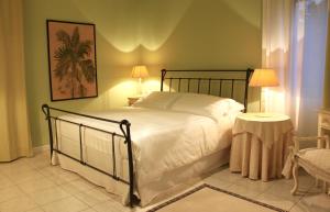 Postel nebo postele na pokoji v ubytování B&B Maison Biagetti